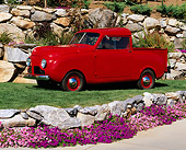 AUT 14 RK0437 01
1948 Crosley Pickup Truck Red 3/4 Side View On Grass By Rocks