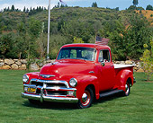AUT 14 RK0645 03
1954 Chevy Pick Up Truck 3100 Series Red 3/4 Front View On Grass Trees