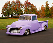 AUT 14 RK0654 03
1950 Chevy Pickup Truck Periwinkle 3/4 Front View On Pavement By Grass Fall Trees