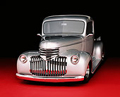 AUT 14 RK0672 02
1946 Chevy Pick Up Truck Silver 3/4 Front View On Red Floor Studio