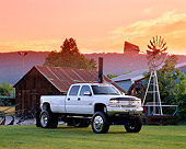 AUT 14 RK0706 04
2002 Chevrolet 3500 Duramax Diesel White 3/4 Front View On Grass By Barn Filtered