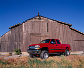 AUT 14 RK0770 02
2002 Chevy 1500 Z71 4WD Pick Up Truck Red Wide Angle 3/4 Side View By Barn Blue Sky