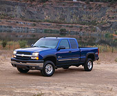 AUT 14 RK0804 03
2003 Chevy Silverado LT 2500HD 4WD Extended Cab Blue 3/4 Front View On Dirt By Water
