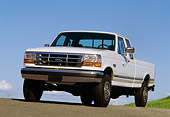 AUT 14 RK0805 31
1993 Ford F-Series Truck White 3/4 Front View On Road Blue Sky