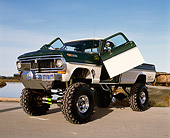 AUT 14 RK0841 13
1970 Ford F250 4x4 Gullwing Monster Truck 3/4 Front View Doors Open On Pavement