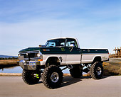 AUT 14 RK0843 05
1970 Ford F250 4x4 Monster Truck 3/4 Front View On Pavement By Water