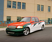 AUT 14 RK0870 06
2001 Ford F-150 Super Crew Custom 3/4 Front View On Pavement By Building