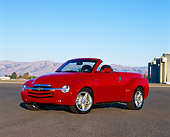 AUT 14 RK0955 01
2003 Chevrolet SSR Convertible Red 3/4 Front View On Pavement Blue Sky