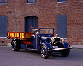 AUT 14 RK0974 03
1921 Hispano Suiza Truck Blue Front 3/4 View On Pavement By Brick Building