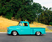 AUT 14 RK1008 01
1957 Chevrolet Pick Up Truck Turquoise 3/4 Front View On Pavement By Trees