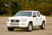 AUT 14 RK1042 01
2006 Honda Ridgeline Truck White 3/4 Front View On Pavement