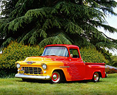 AUT 14 RK1074 04
1955 Chevy 3100 1/2 Ton Pick Up Truck Red With Flames 3/4 Side View On Grass Trees Background