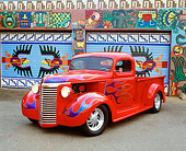 AUT 14 RK1081 03
1940 Chevy 1/2 Ton Pick Up Truck Red With Flames 3/4 Front View On Pavement By Artwork