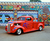 AUT 14 RK1082 07
1940 Chevy 1/2 Ton Pick Up Truck Red With Flames 3/4 Side View On Pavement By Artwork