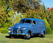 AUT 14 RK1105 02
1950 Chevy Panel 1 Ton Truck Blue 3/4 Front View On Grass By Trees