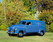 AUT 14 RK1107 02
1950 Chevy Panel 1 Ton Truck Blue 3/4 Side View On Grass By Trees