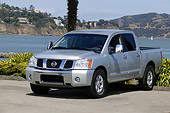 AUT 14 RK1127 01
2004 Nissan Frontier Silver Front 3/4 View On Pavement By Water