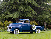 AUT 14 RK1146 01
1950 Chevrolet 3100 Pick Up Truck Blue 3/4 Side View On Grass By Trees