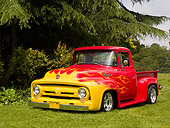 AUT 14 RK1150 01
1956 Ford F-100 1/2 Ton Pick Up Truck Red With Flames 3/4 Front View On Grass By Trees