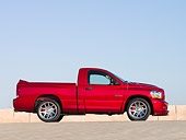 AUT 14 RK1176 01
2006 Dodge Ram SRT-10 Pick Up Truck Red Low Profile View On Pavement