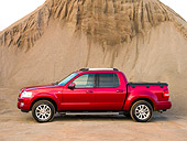 AUT 14 RK1180 01
2007 Ford Explorer Sport Trac Pick Up Truck Red Profile Shot On Sand