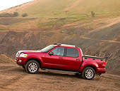AUT 14 RK1191 01
2007 Ford Explorer Sport Trac Limited Pick Up Truck Red 3/4 Front View On Dirt Hill