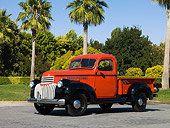 AUT 14 RK1202 01
1946 Chevrolet CK 1/2 Ton Red And Black Pick Up Truck Side 3/4 View On Pavement
