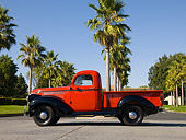 AUT 14 RK1204 01
1946 Chevrolet CK 1/2 Ton Red And Black Pick Up Truck Profile View On Pavement