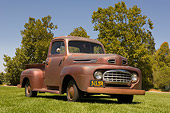 AUT 14 RK1211 01
1948 Ford F1 Unrestored Red Pick Up Truck Low 3/4 Front View On Grass