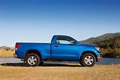 AUT 14 RK1228 01
2007 Toyota Tundra SR5 Single Cab Blue Metallic Low Profile View On Gravel