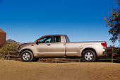 AUT 14 RK1234 01
2007 Toyota Tundra Double Cab SR5 Long Bed Sand Mica Low Profile View On Dirt