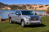 AUT 14 RK1239 01
2007 Toyota Tundra Double Cab Limited TRD Slate 3/4 Front View On Grass By Lake And Hills