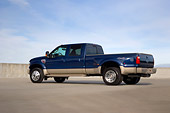 AUT 14 RK1289 01
2008 Ford F-450 Super Duty King Ranch Blue And Silver Low 3/4 Rear View On Pavement