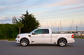 AUT 14 RK1295 01
2007 Saleen S331 Supercharged Sport Truck White Low Profile View On Pavement