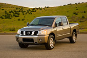 AUT 14 RK1302 01
2007 Nissan Titan 4x4 SE Gray 3/4 Front View On Pavement By Hills