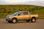 AUT 14 RK1303 01
2007 Nissan Titan 4x4 SE Gray 3/4 Side View On Pavement By Hills
