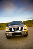 AUT 14 RK1304 01
2007 Nissan Titan 4x4 SE Gray Slanted Head On View On Pavement By Hills