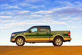 AUT 14 RK1307 01
2007 Ford F-150 King Ranch Lariat Green Low Profile View On Pavement