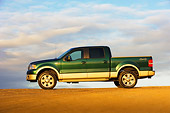 AUT 14 RK1308 01
2007 Ford F-150 King Ranch Lariat Green Low Profile View On Pavement