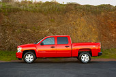 AUT 14 RK1320 01
2007 Chevrolet Silverado 1500 2WD Crew Cab LT2 Red Profile View On Pavement
