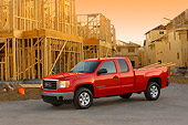 AUT 14 RK1325 01
2007 GMC Sierra 1500 4WD Extended Cab SLE1 Red 3/4 Side View By Construction Site