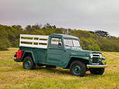 AUT 14 RK1338 01
1956 Willys Jeep Pick Up Truck L6-226 Green 3/4 Side View On Grass