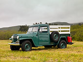 AUT 14 RK1340 01
1956 Willys Jeep Pick Up Truck L6-226 Green 3/4 Side View On Grass