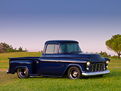 AUT 14 RK1350 01
1956 Chevrolet 3100 Pick Up Truck Blue 3/4 Side View On Grass