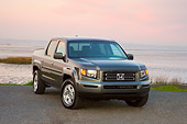 AUT 14 RK1360 01
2008 Honda Ridgeline RTS Gray 3/4 Front View On Dirt By Water
