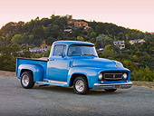 AUT 14 RK1399 01
1956 Ford F-100 Pickup Truck Blue 3/4 Front View On Pavement By Hill