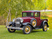 AUT 14 RK1408 01
1930 Ford Model A Pickup Truck Maroon 3/4 Front View On Grass By Trees