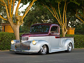 AUT 14 RK1415 01
1946 Chevrolet Pickup Truck Silver And Maroon 3/4 Front View On Pavement By Trees