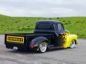 AUT 14 RK1466 01
1954 Chevrolet Pickup Truck Hot Rod Black With Yellow Flames 3/4 Rear View On Pavement By Hills