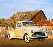 AUT 14 RK1475 01
1952 Chevrolet 3100 Pickup Truck Tan And Green 3/4 Front View On Dirt By Fence And Barn
